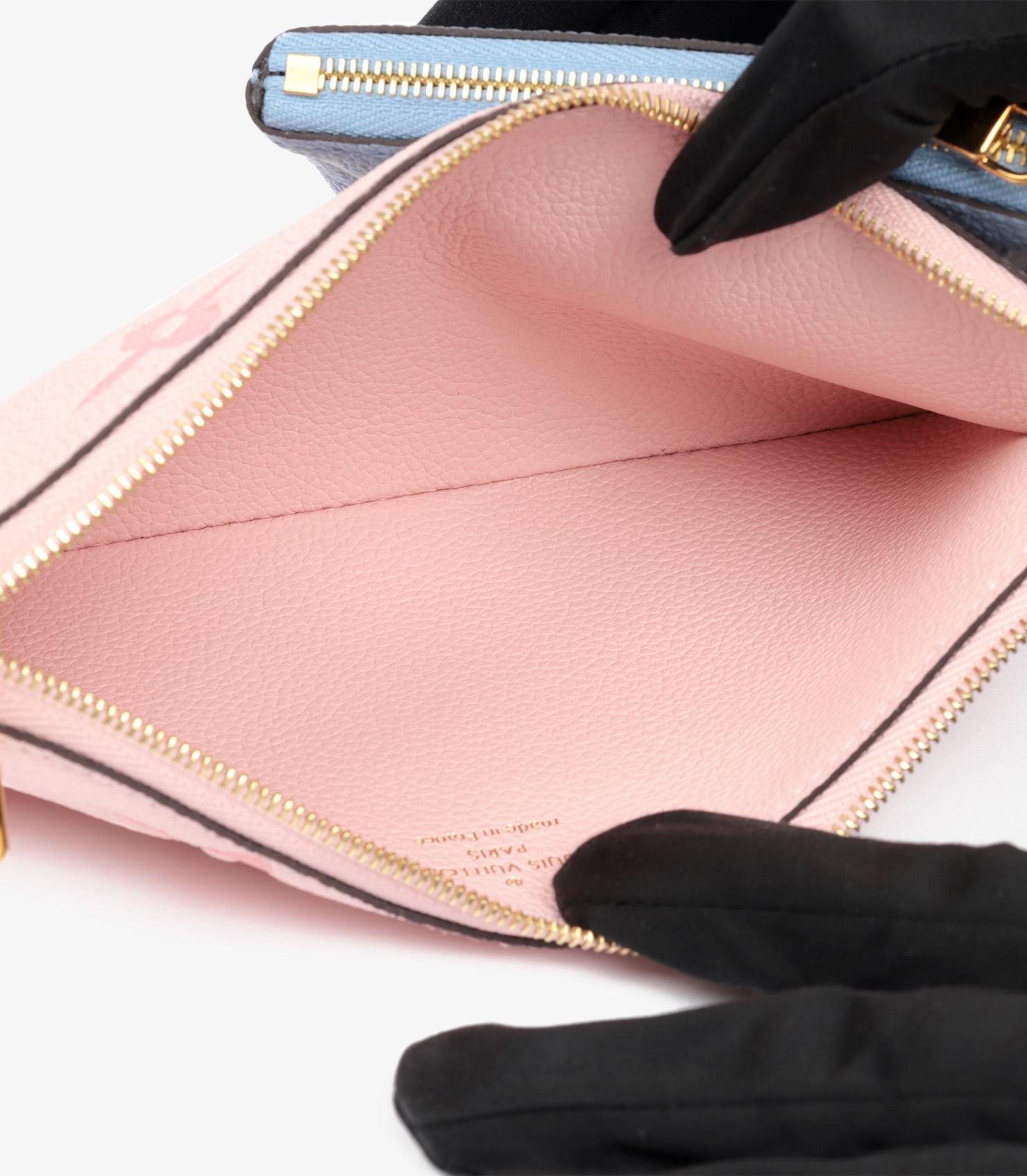 Women's or Men's Louis Vuitton Beige, Blue & Pink Pastel Monogram Empreinte Leather Pochette Trio For Sale