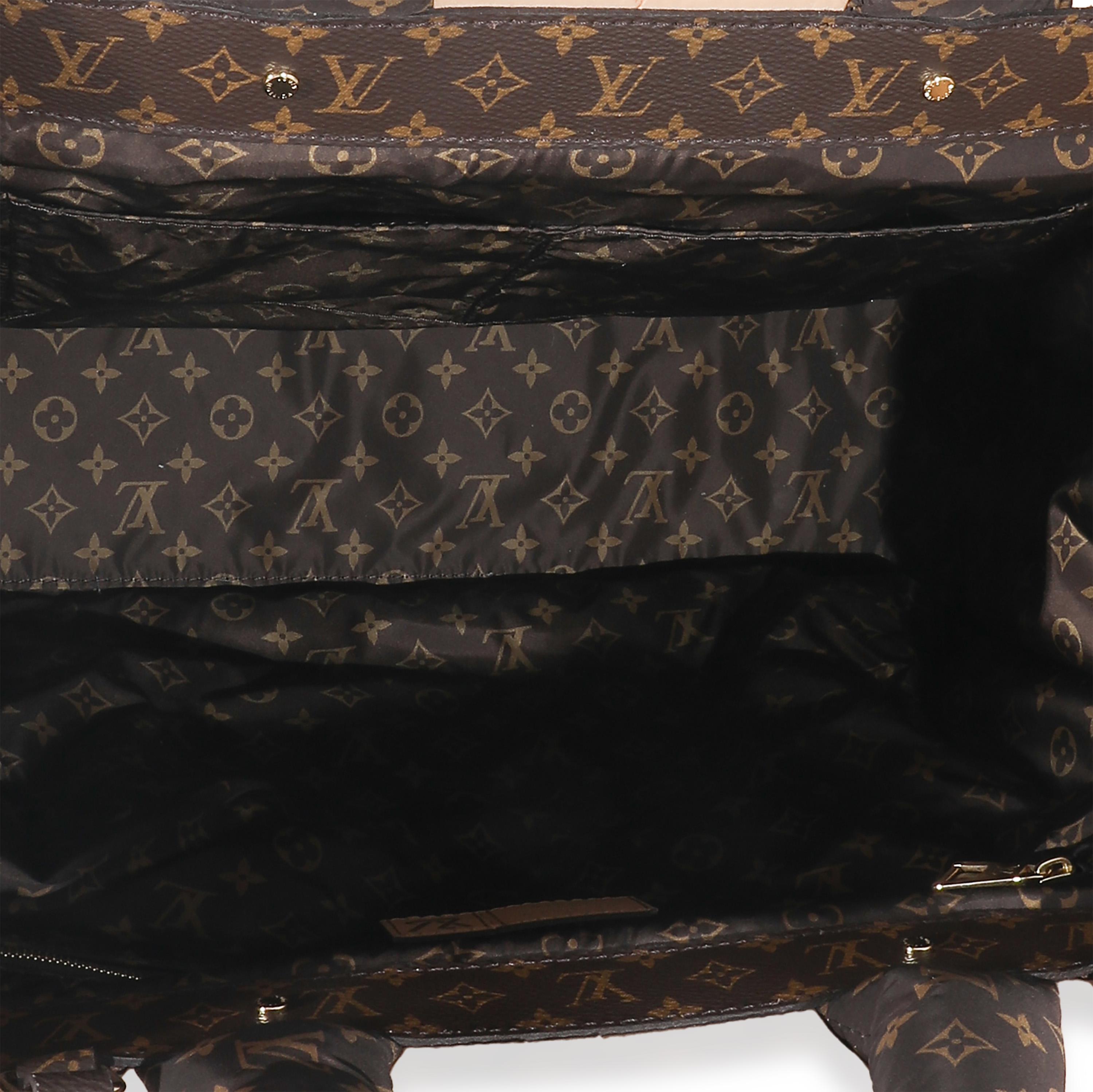 Listing Title: Louis Vuitton Beige Econyl Nylon Monogram Pillow Giant Onthego GM
SKU: 132777
MSRP: 3250.00 USD
Condition: Pre-owned 
Handbag Condition: Excellent
Condition Comments: Item is in excellent condition and displays light signs of