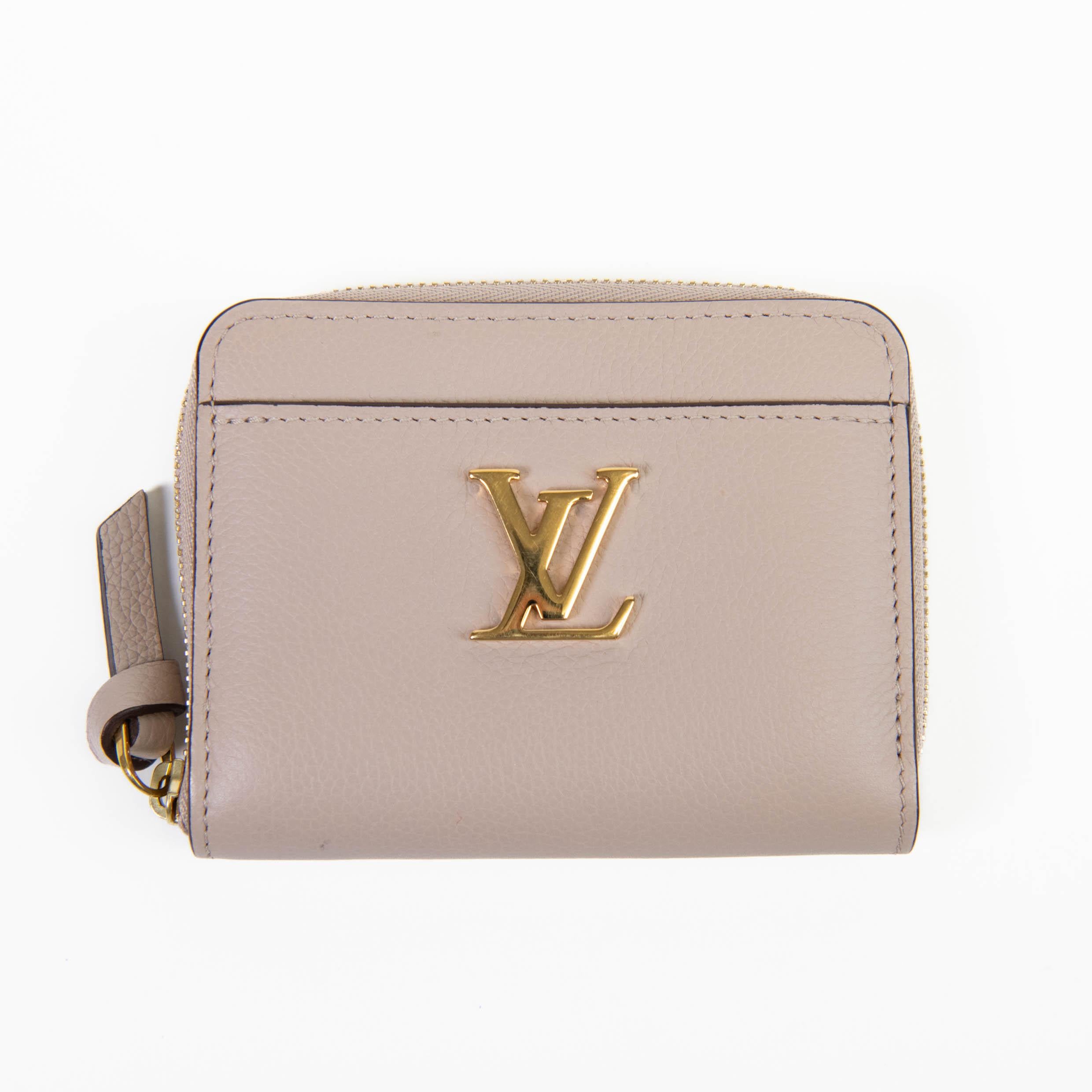 Women's or Men's Louis Vuitton Beige Leather Lockme Zippy Coin Purse