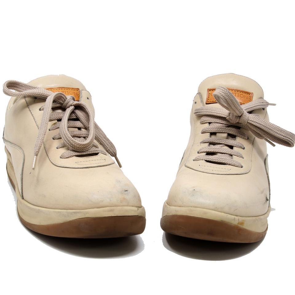 Louis Vuitton Beige Classic LV Women'S Calfskin Leather Lace Up Leisure 39.5 LV-S0917P-0161 Sneakers

These stylish men's sneakers are crafted of luxurious calfskin leather in beige. These feature a leather matching stripe along each side of shoes.