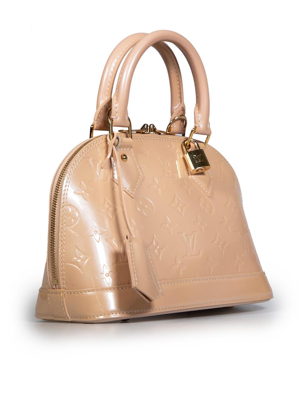 CONDITION is Very good. Hardly any visible wear to bag is evident on this used Louis Vuitton designer resale item. This bag includes original long strap and dust bag. The NFC chip is not readable.
 
 Details
 
 
 Model: Alma BB
 
 Beige
 
 Patent
 
