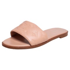 Louis Vuitton Beige Monogram Embossed Leather Revival Flat Flat Mule Size 38