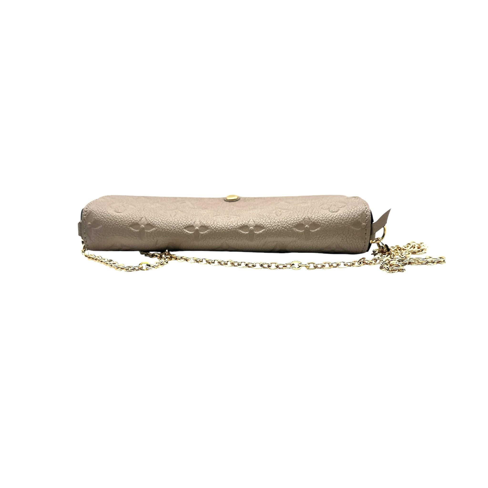Women's Louis Vuitton Beige Monogram Empreinte Félicie Pochette