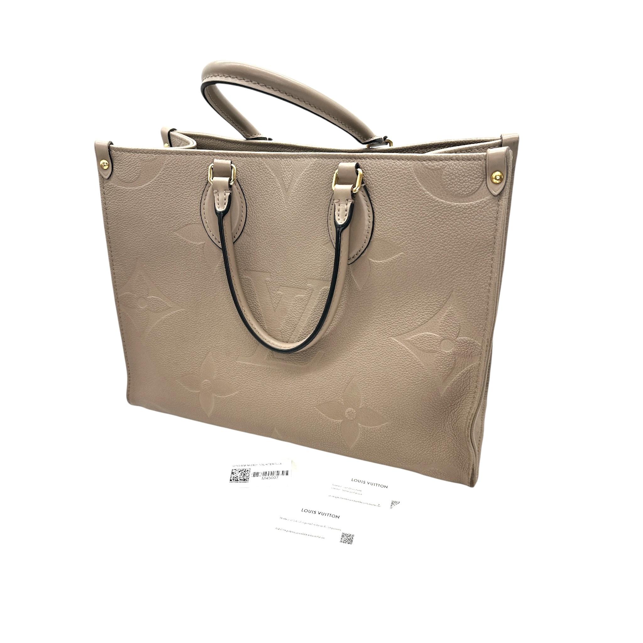 Louis Vuitton Beige Monogram Empreinte Leather Onthego MM Tote In Good Condition For Sale In Scottsdale, AZ