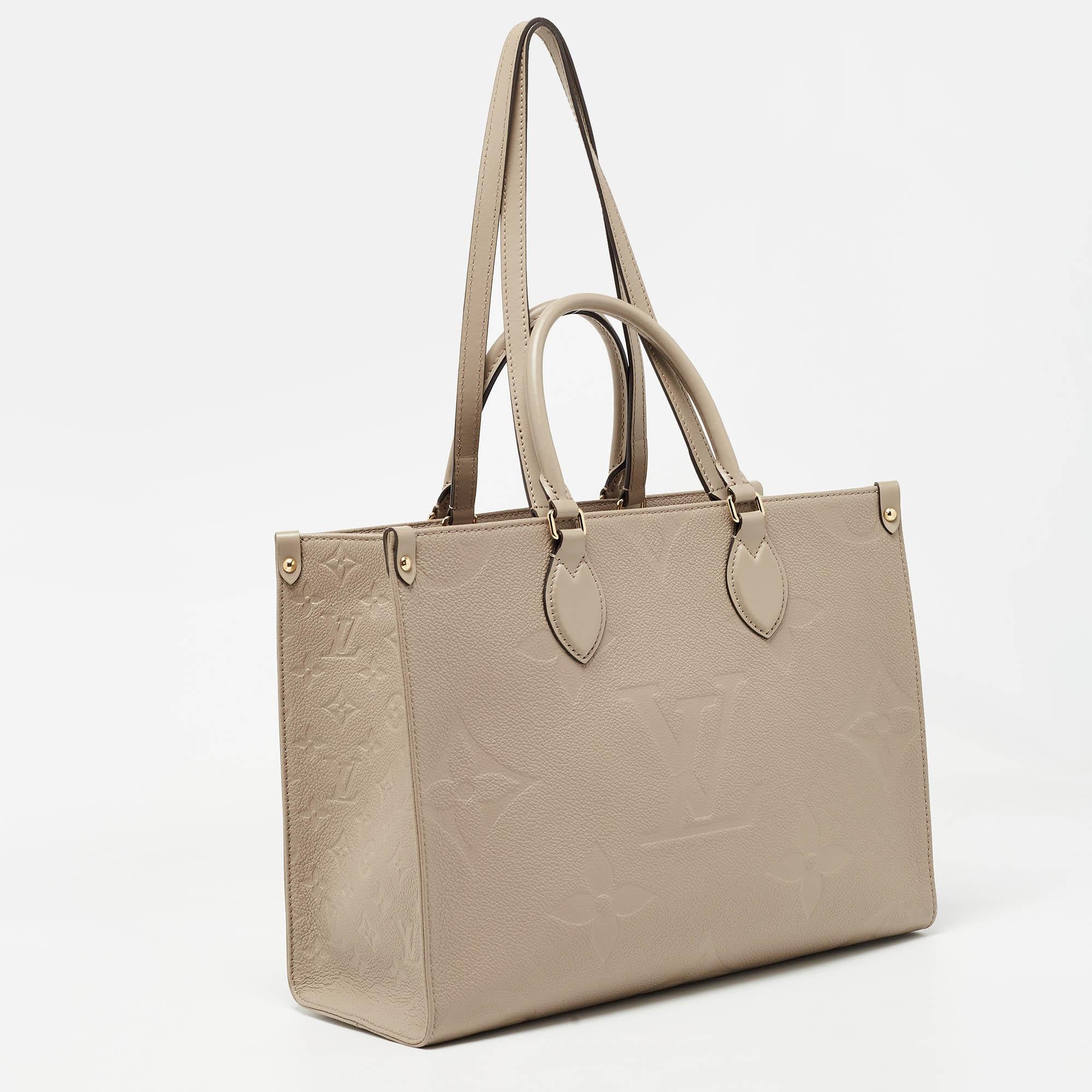 Louis Vuitton Beige Monogram Empriente Leather Giant Onthego MM Bag In Good Condition For Sale In Dubai, Al Qouz 2