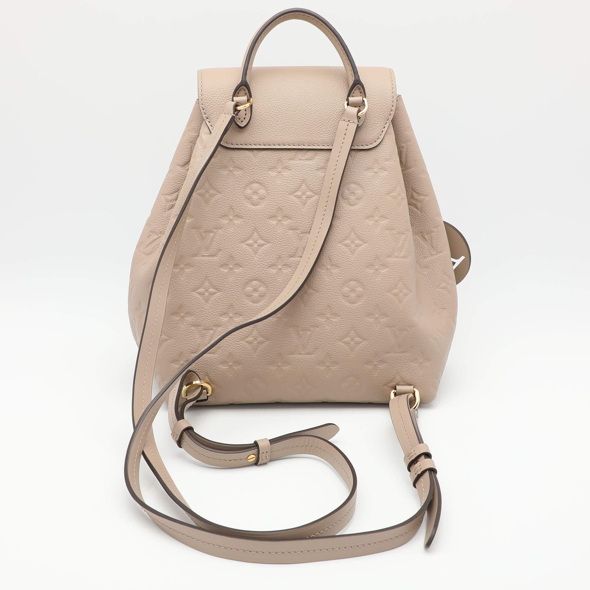 Louis Vuitton Sac à dos Montsouris PM en cuir beige avec monogramme Empriente Bon état - En vente à Dubai, Al Qouz 2