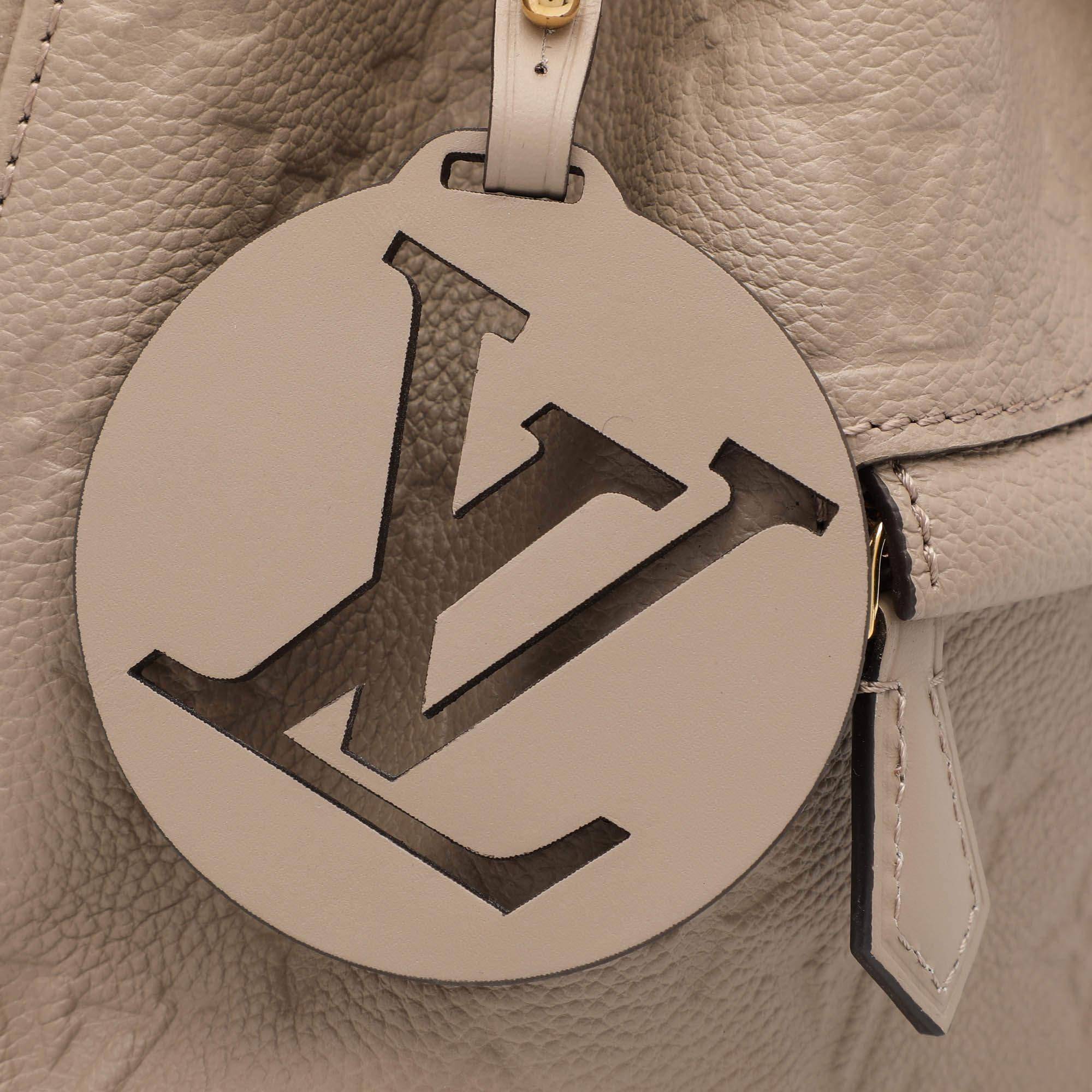 Louis Vuitton Sac à dos Montsouris PM en cuir beige avec monogramme Empriente en vente 2