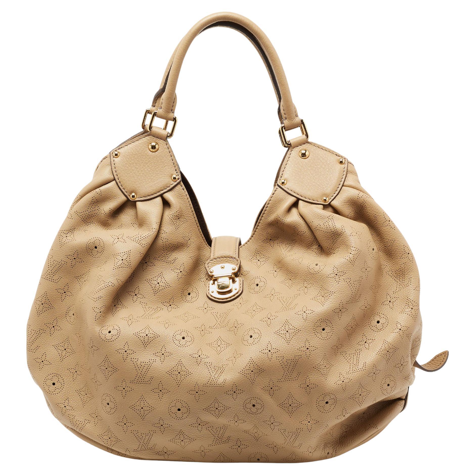Louis Vuitton Beige Monogram Mahina Leather L Bag at 1stDibs