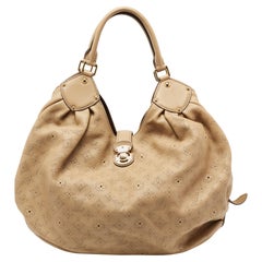 Beige Monogrammierte Mahina-Ledertasche von Louis Vuitton