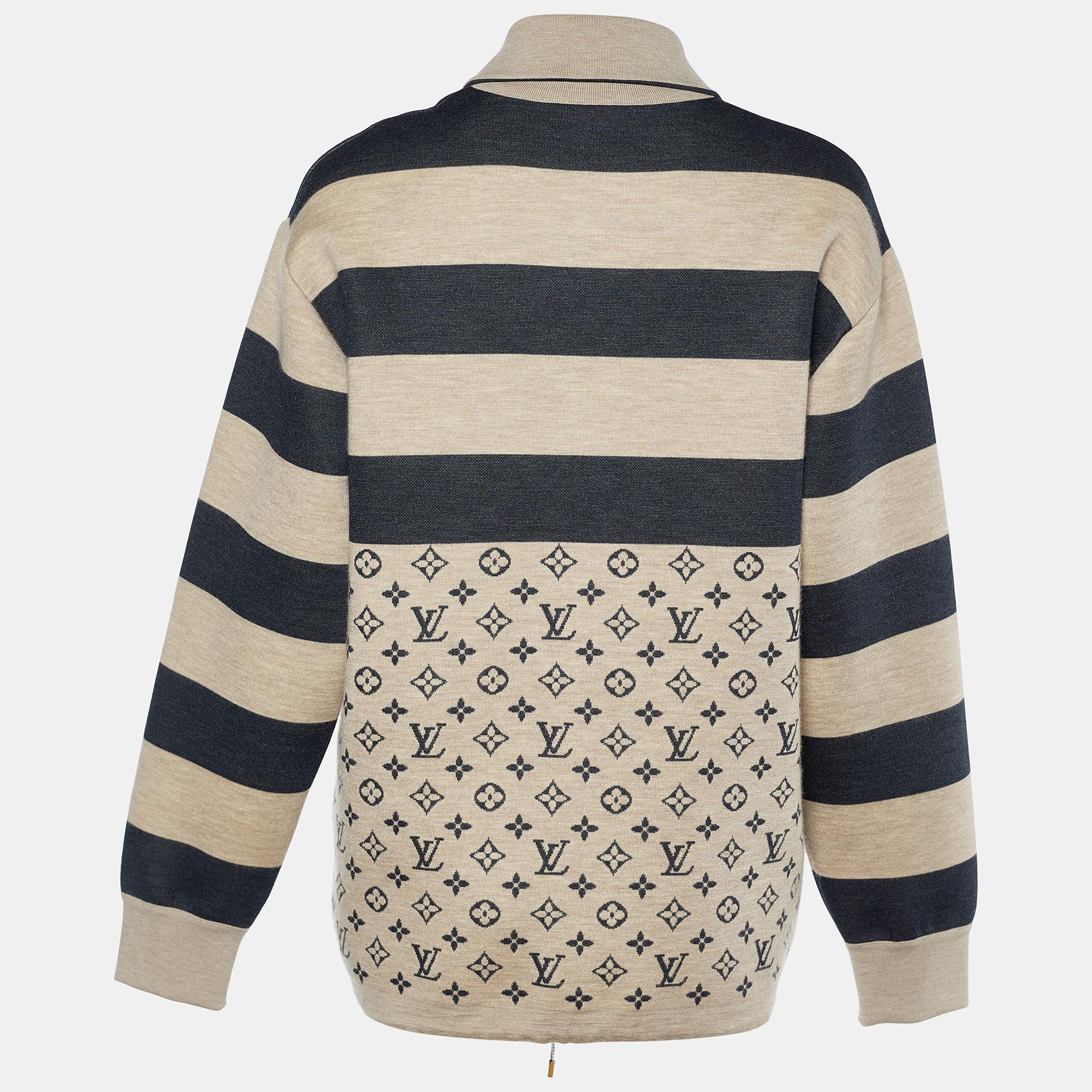 Louis Vuitton's signature styles are truly impressive, and this classy jacket is a testament to that! Made from beige and navy cashmere blend fabric, this jacket is embellished with striped and Monogram prints. This LV jacket is provided with a
