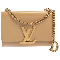 Louise patent leather clutch bag Louis Vuitton Beige in Patent