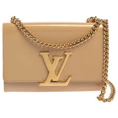 Louis Vuitton - Sac Louise MM en cuir verni beige avec chaînes