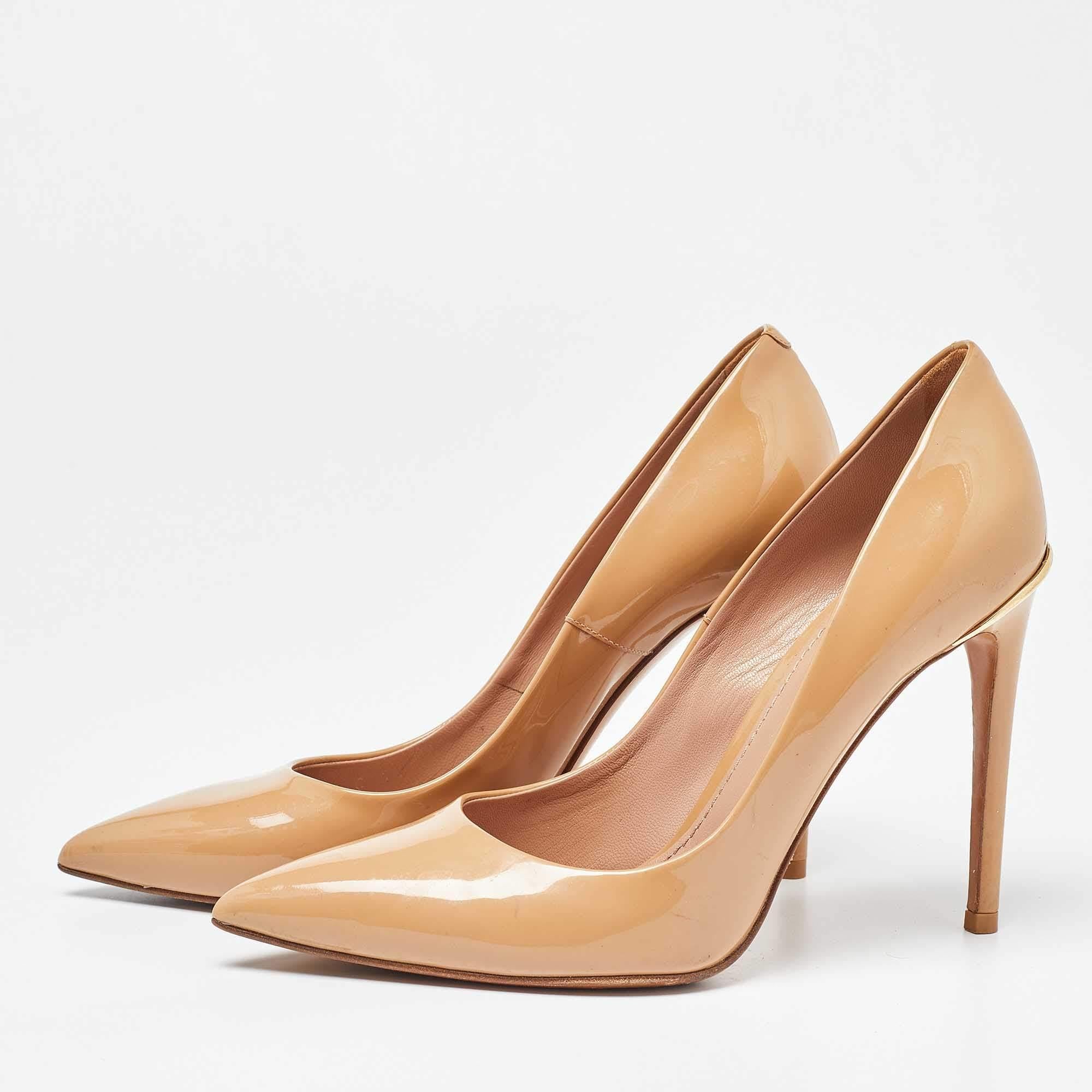 Exhibit an elegant style with this pair of pumps. These elegant shoes are crafted from quality materials. They are set on durable soles and sleek heels.

Includes: Original Dustbag