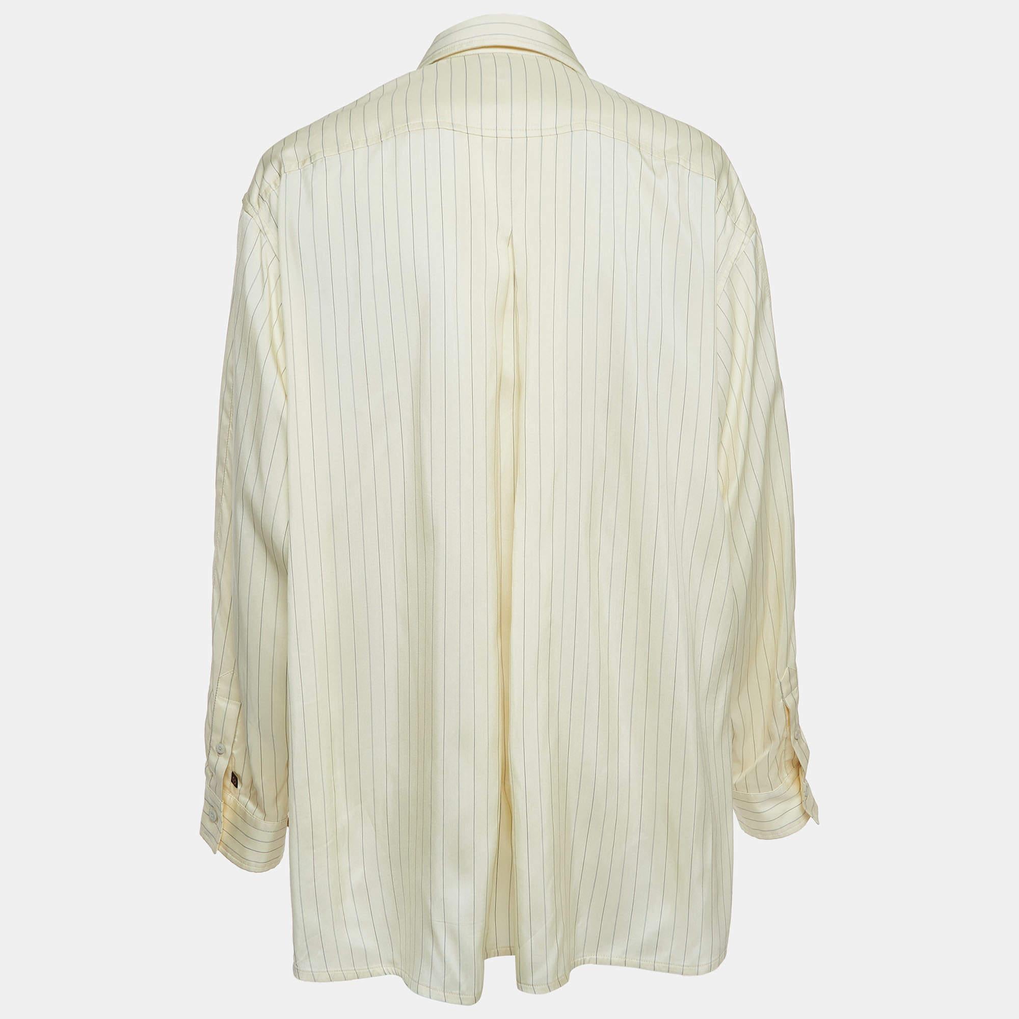 The Louis Vuitton shirt is a luxurious blend of sophistication and style. Crafted from sumptuous silk, it features subtle beige pinstripes, a unique dipped hem design, and a sleek zip-up closure, exuding elegance and modernity.

Includes: lv hanger,