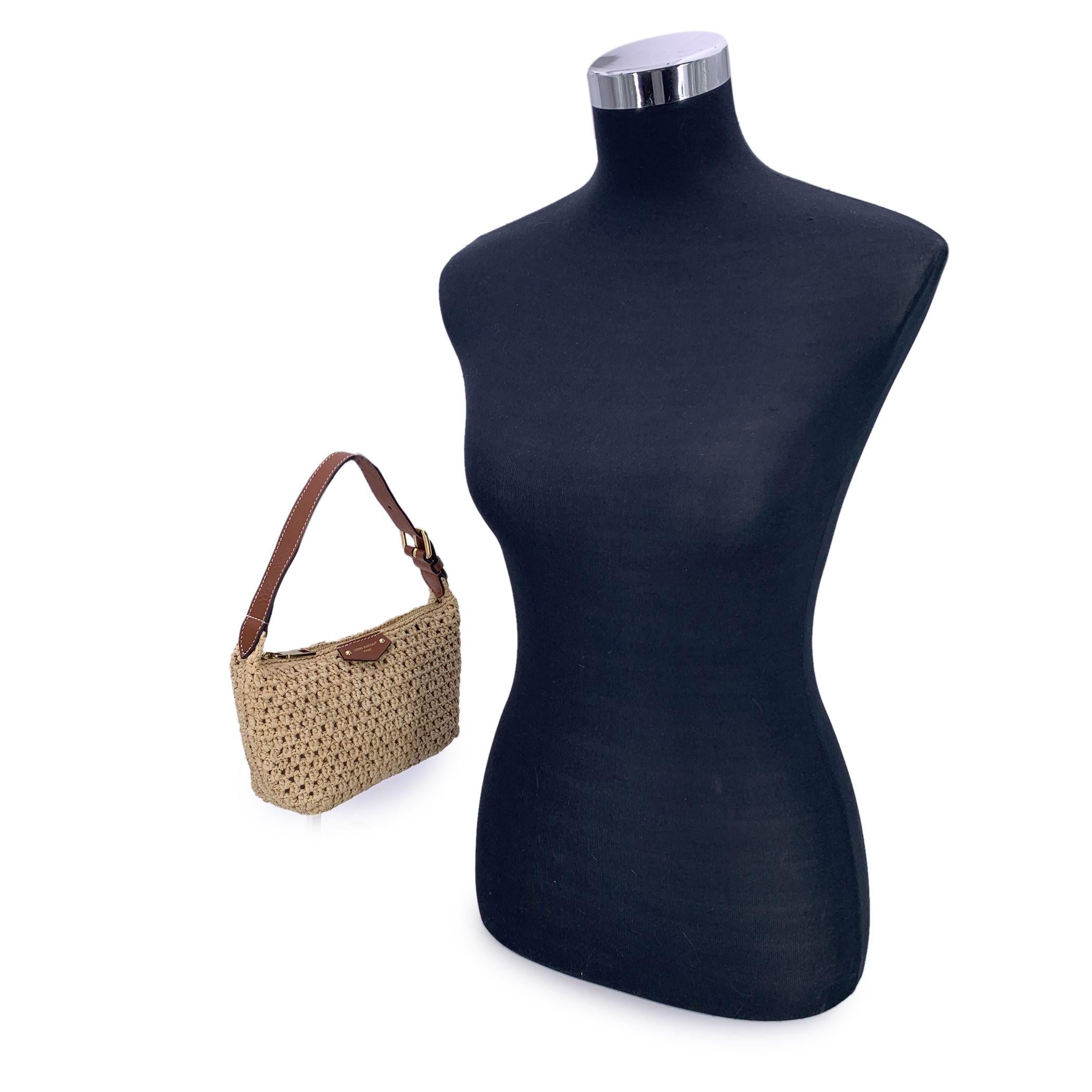 This beautiful item will come with a Certificate of Authenticity provided by Entrupy. The certificate will be provided at no further cost Effortlessly elegant and made for long summer nights, the Hills pouch is a refined accessory that captures the
