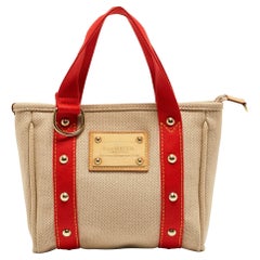 Louis Vuitton Sac Cabas PM Antigua en toile beige/rouge