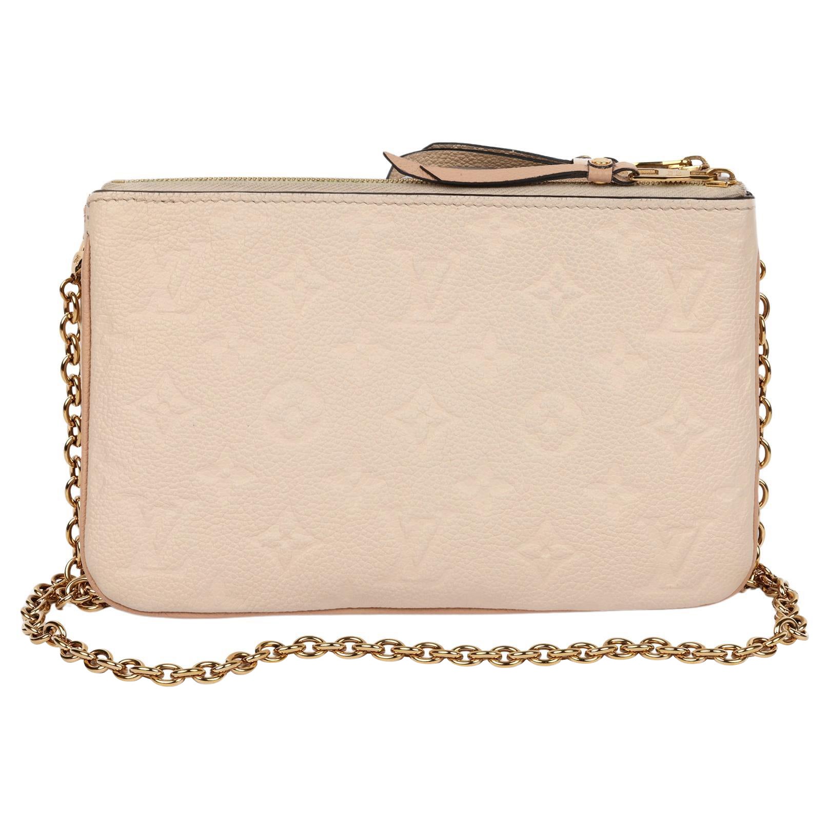 Louis Vuitton Beige & Rose Creme Empreinte Pochette mit doppeltem Reißverschluss