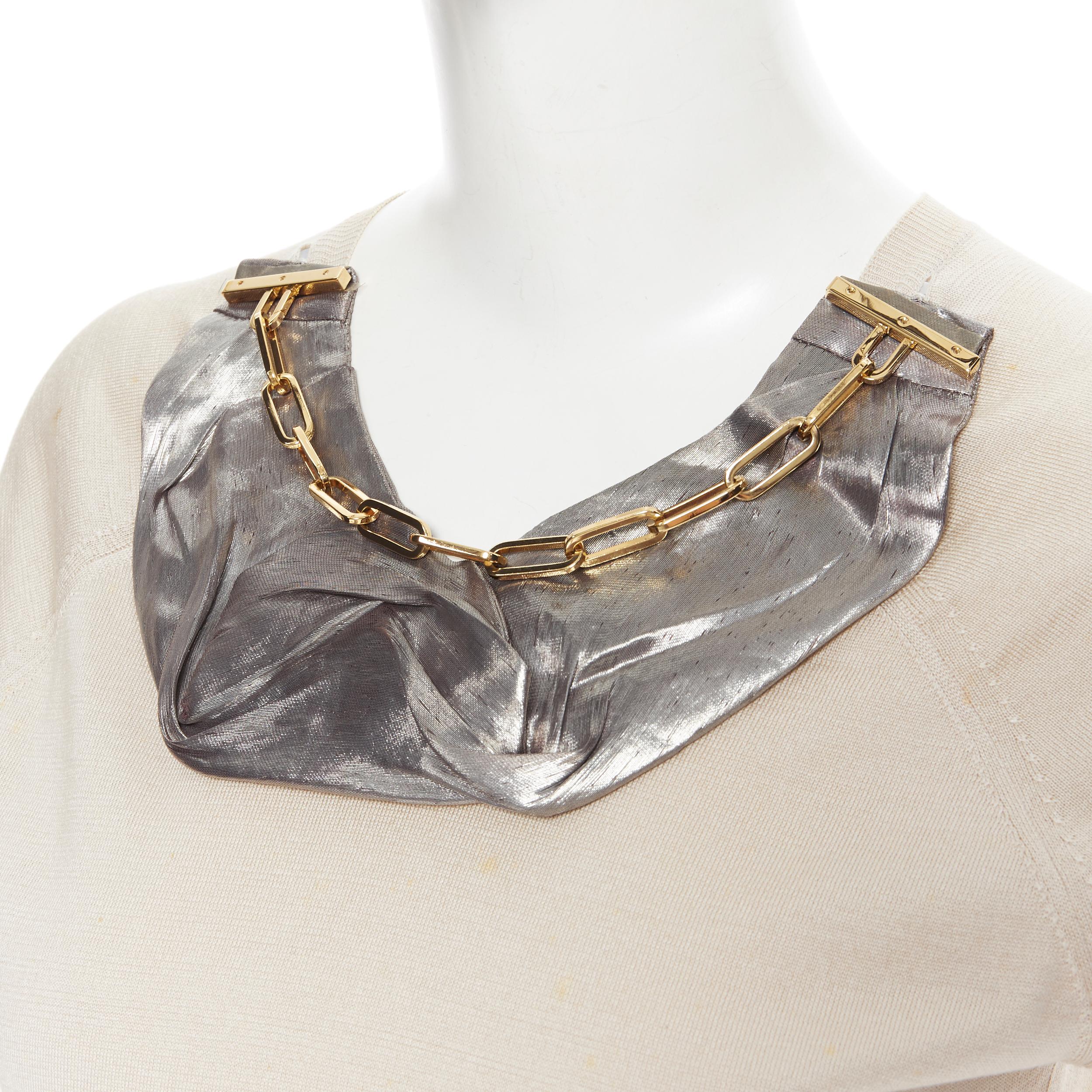 LOUIS VUITTON beige silk cotton knit gold chain necklace pullover top XS 
Reference: LNKO/A01688 
Brand: Louis Vuitton 
Material: Silk 
Color: Beige 
Pattern: Solid 
Extra Detail: Gold tone chunky chain necklace. 
Made in: Italy 

CONDITION: