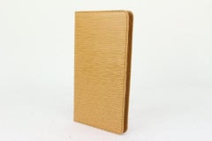 Louis Vuitton - Grand portefeuille à rabat bifold en cuir épi beige-jaune 193lvs712