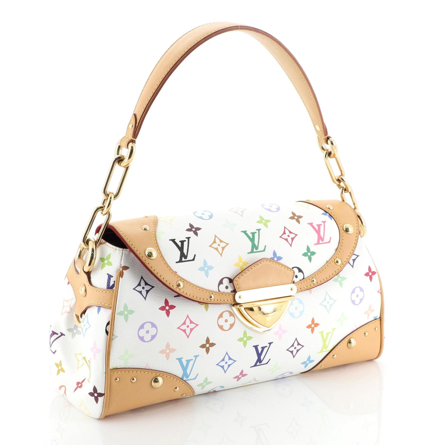 This Louis Vuitton Beverly Handbag Monogram Multicolor MM, crafted from white multicolor monogram coated canvas, features natural cowhide leather shoulder strap and gold-tone hardware. Its oversized push-lock closure opens to a red microfiber