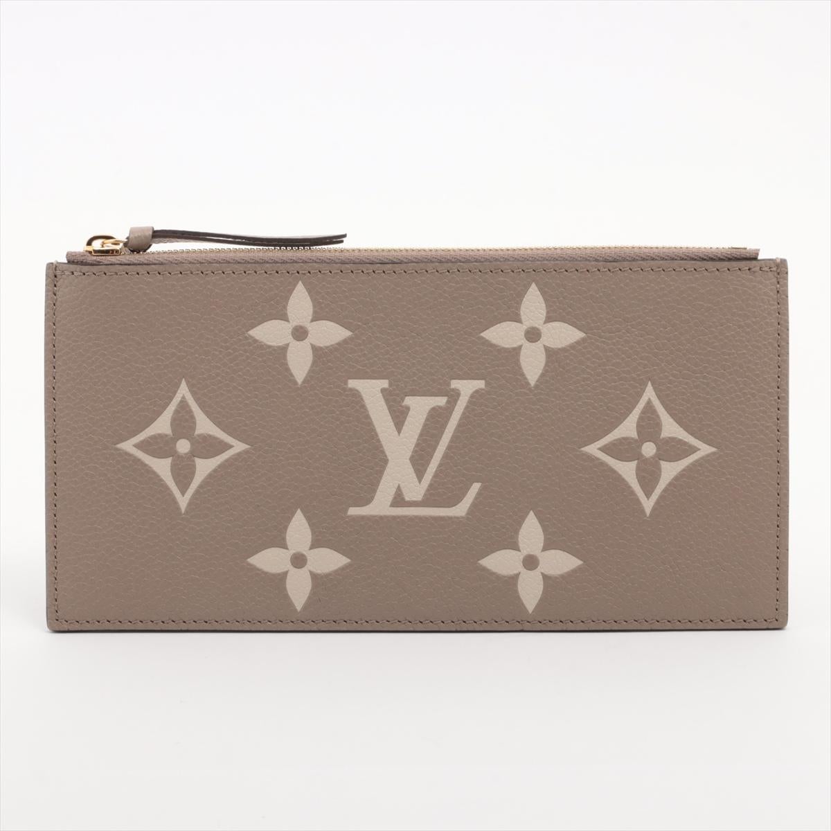 *ships about 12/11

The Louis Vuitton Monogram Empreinte Pochette Félicie in Tourterelle x Crème is a sleek and elegant pouch crafted from supple Monogram-embossed leather in soft neutral tones. Designed as a standalone accessory, the pouch offers a