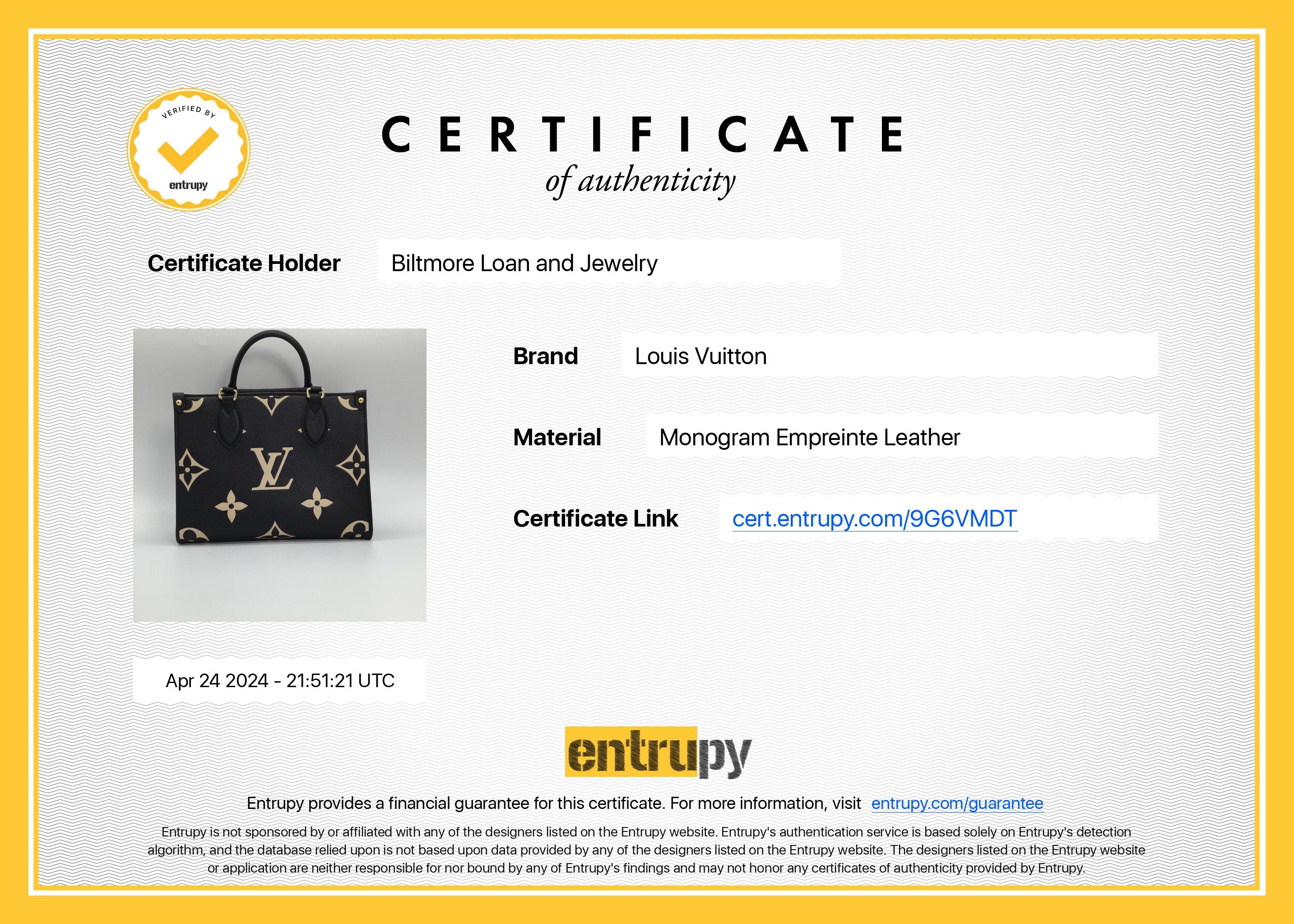 Indulge in the luxurious Bicolor Monogram Giant Empreinte OnTheGo PM by Louis Vuitton. This limited edition tote features oversized versions of the classic monogram leather, along with black leather top handles, an optional shoulder strap, and