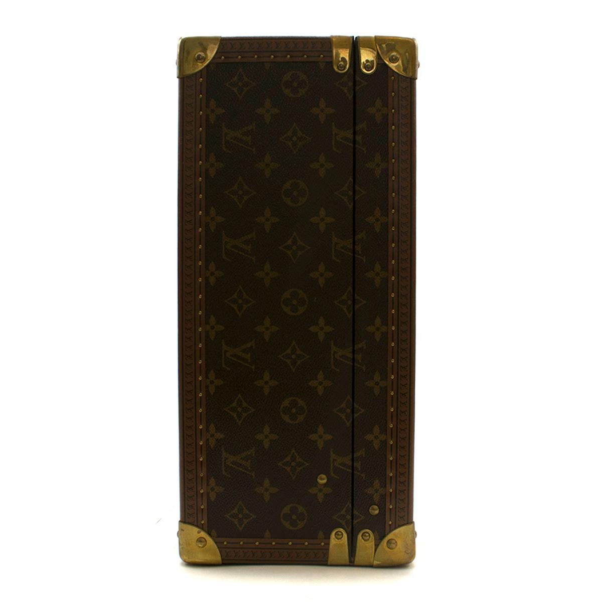 Louis Vuitton Bisten 55 Monogram Canvas Travel Suitcase

- Monogram canvas, canvas lining,
- Rounded leather handles
 - Canvas interior, support handles
- Louis Vuitton 