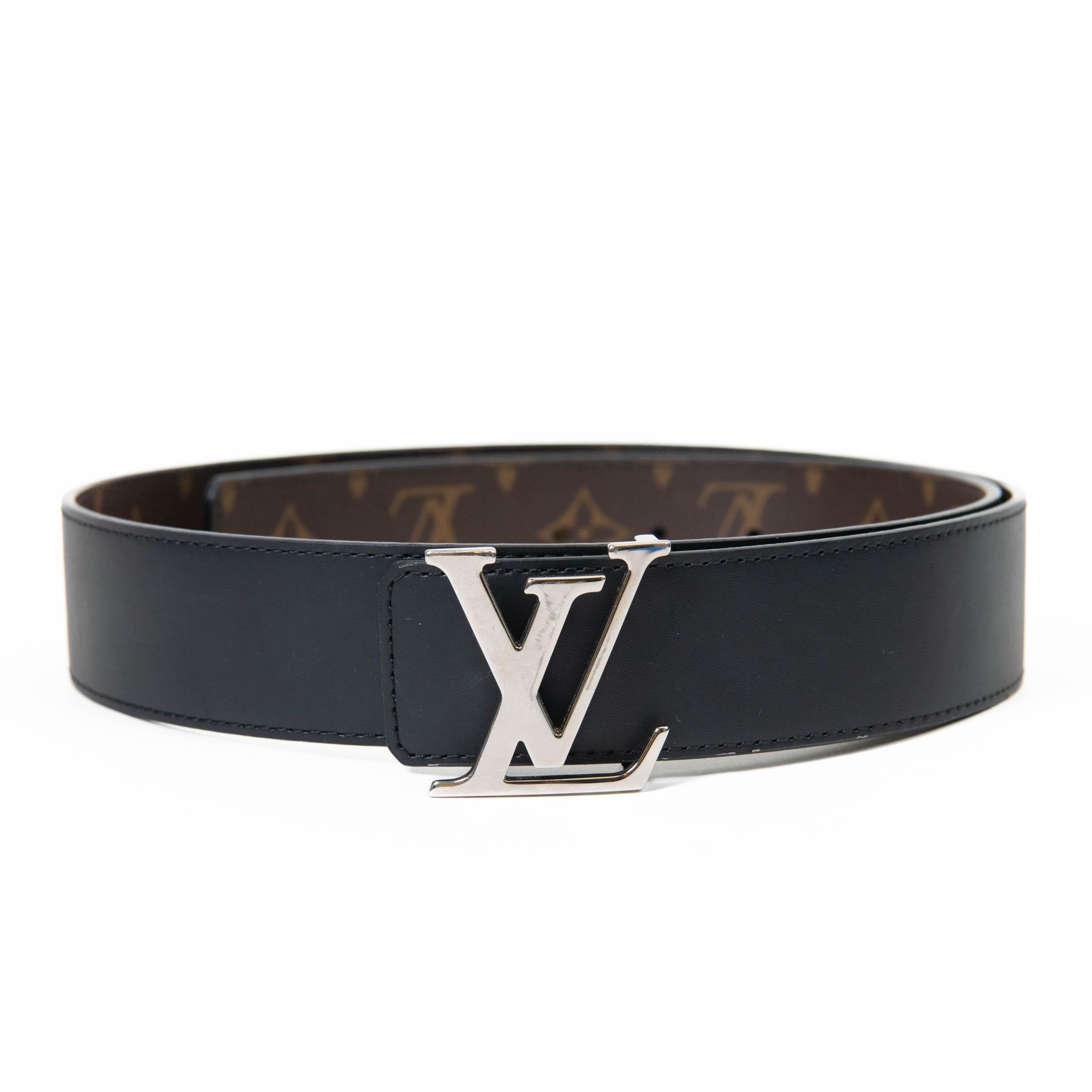 100% Authentic

 The bold style and stunning detailing of this Louis Vuitton belt make it a fabulous fashion accessory. It has the classic Louis Vuitton monogram on coated canvas and reverses to black leather with a buckle that is a silver Louis