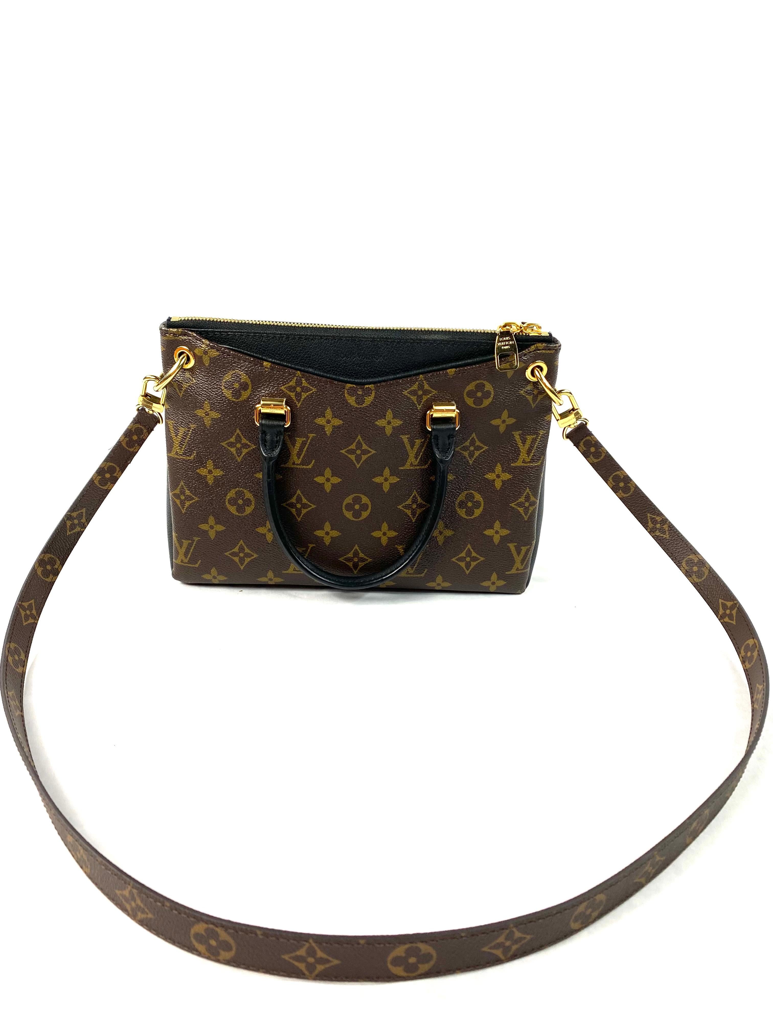 Product details:

The mini tote is made out of Louis Vuitton monogram on canvas with black leather trim. It features front and rear exterior pockets. It comes with removable shoulder strap that drops inches long, dust bag, original box and receipt. 