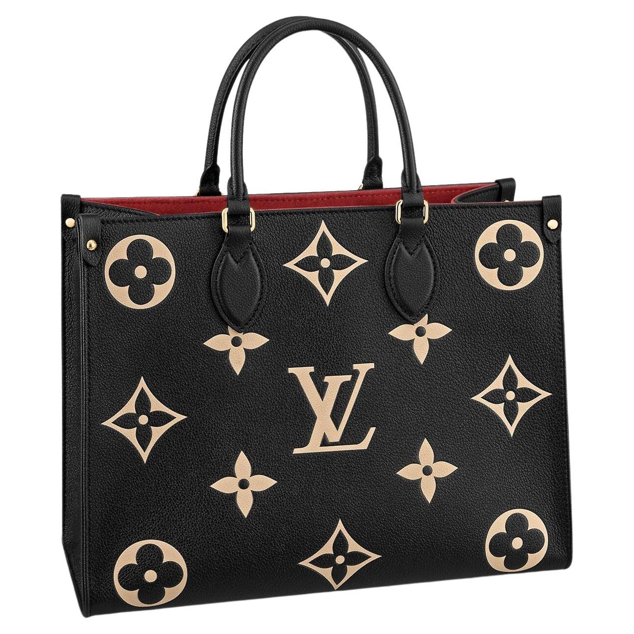 Louis Vuitton Black/Beige Bicolour Monogram Empreinte Leather On The Go MM  Bag For Sale at 1stDibs | louis vuitton black and beige bag, on the go  empreinte mm