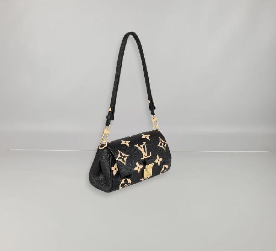 This shoulder bag has a removable and adjustable strap that enables short shoulder carry or cross-body wear, while a bold detachable gold-colour chain allows more glamorous evening use. It also features an inside flat pocket. 
Strap drop: 27 cm.