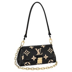 Louis Vuitton Black And Beige Bag - 28 For Sale on 1stDibs
