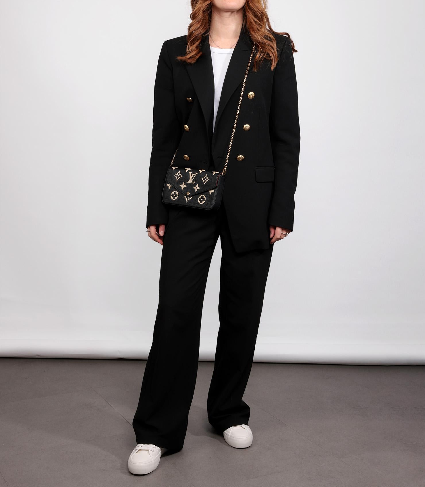 Louis Vuitton Black & Beige Monogram Empreinte Leather Pochette Félicie

Product Details
Xupes Ref: HB5753
Brand: Louis Vuitton
Model: Pochette Félicie
Type: Shoulder, Crossbody, Clutch
Age: 2023
RRP: £1,300
Accompanied By: Interior Pouch
Colour: