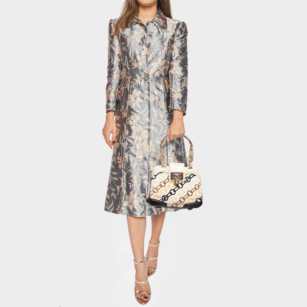 Designer bags are ideal companions for ample occasions Here we have a fashion meets functionality piece crafted with precision. It has been equipped with a well sized interior that can easily fit your small essentials.