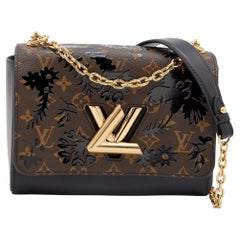 Louis Vuitton - Sac Twist MM noir Blossom en toile et cuir avec monogramme