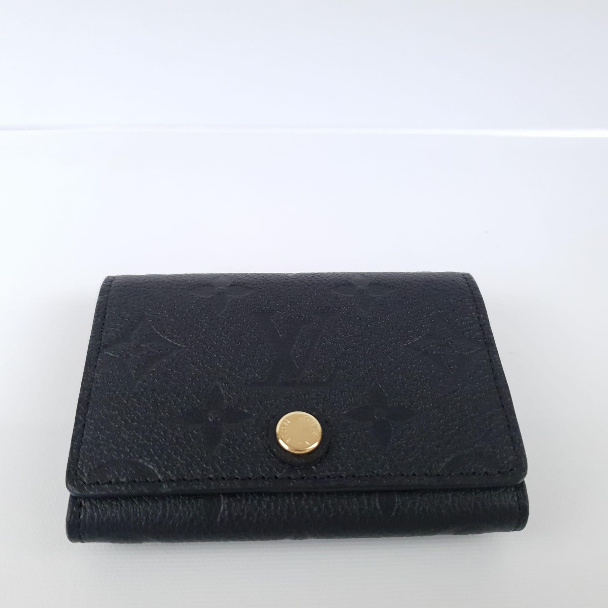 Black
Monogram Empreinte embossed supple grained cowhide leather
Grained cowhide leather lining
Gold metallic finishes
Snap button closure
Card slot
Gusseted compartment