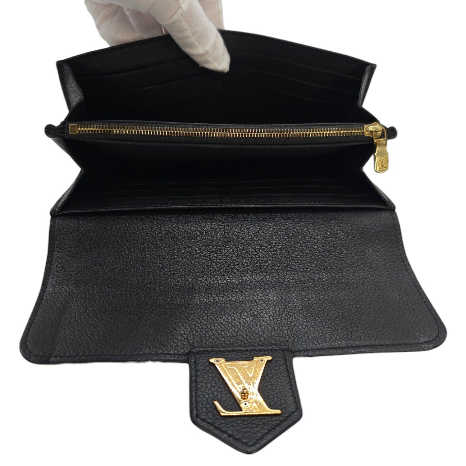 Louis Vuitton LockMe Langes Portemonnaie aus schwarzem Kalbsleder 1