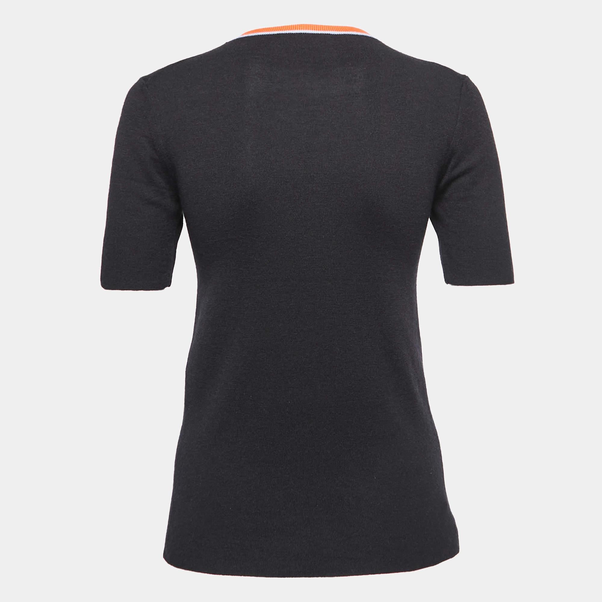 Louis Vuitton brings you this simple yet chic top in black. Made from a cashmere blend, it has a round neckline, short sleeves, and embellishments on the front. Wear this top tucked into a comfy pair of jeans or a skirt for an effortless look.

