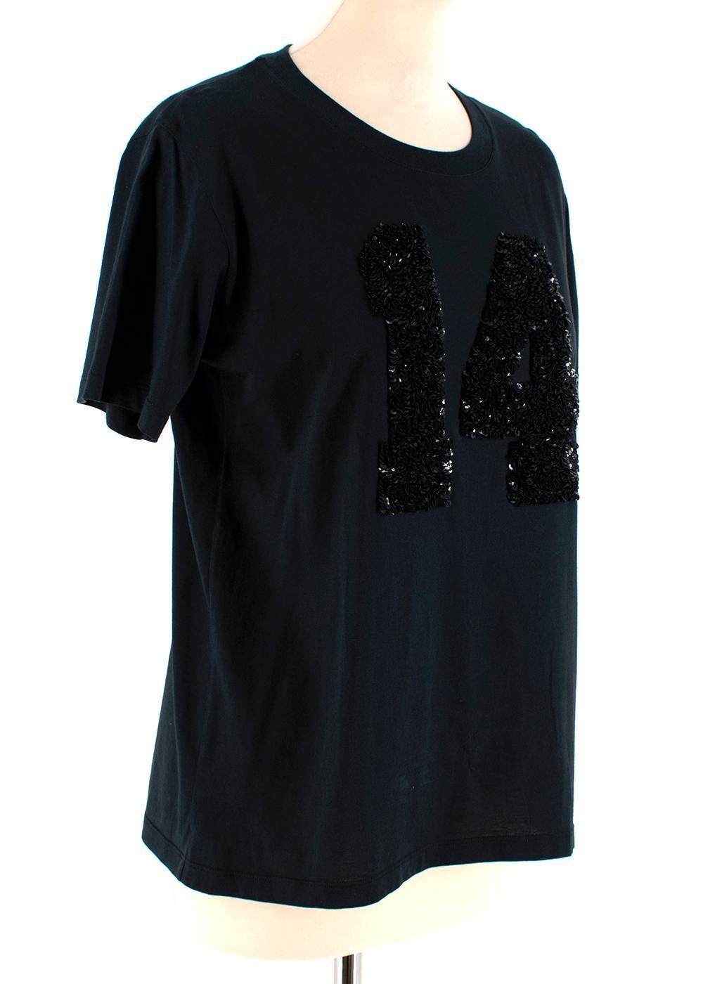 Louis Vuitton Black Cotton 'Paris' 14 Sequin Embellished T-shirt

- Sequin Embellishment to front and back 
- Rounded Neckline 
- Straight Hemline
- Short-Sleeved

Materials 
100% Cotton 

Dry Clean Only 

Made in Italy 

Shoulders: 10cm
Sleeves: