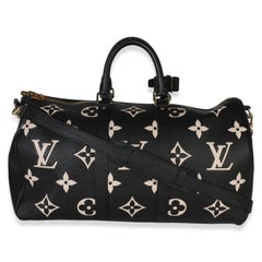 Louis Vuitton Keepall Bandoulière 45 in Schwarz-Creme mit großem Monogram Empreinte-Muster