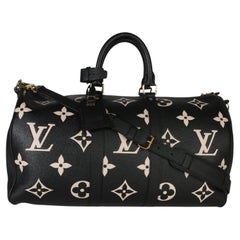 Louis Vuitton Keepall Bandoulière 45 in Schwarz-Creme mit großem Monogram Empreinte-Muster