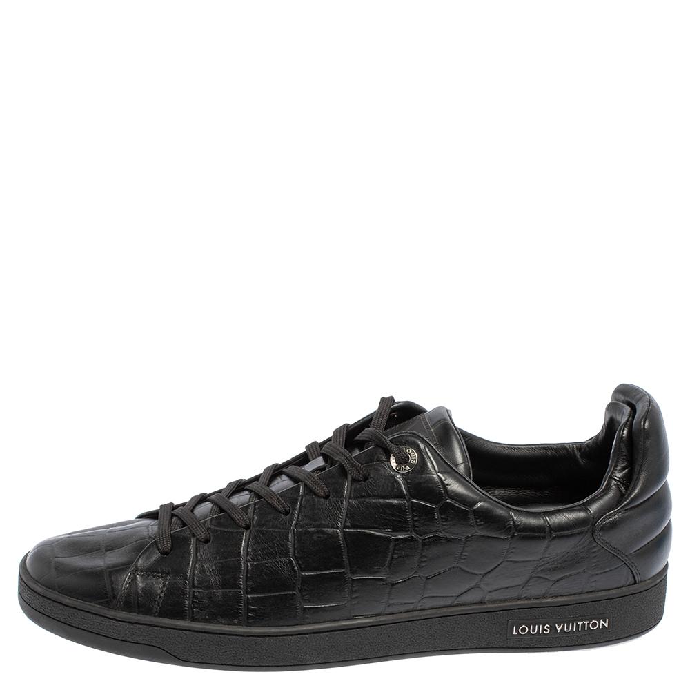 You'll love wearing these Front Row sneakers from Louis Vuitton! The black sneakers are crafted from croc-embossed leather and feature round toes and lace-ups on the vamps. They come equipped with comfortable leather-lined insoles and tough soles.