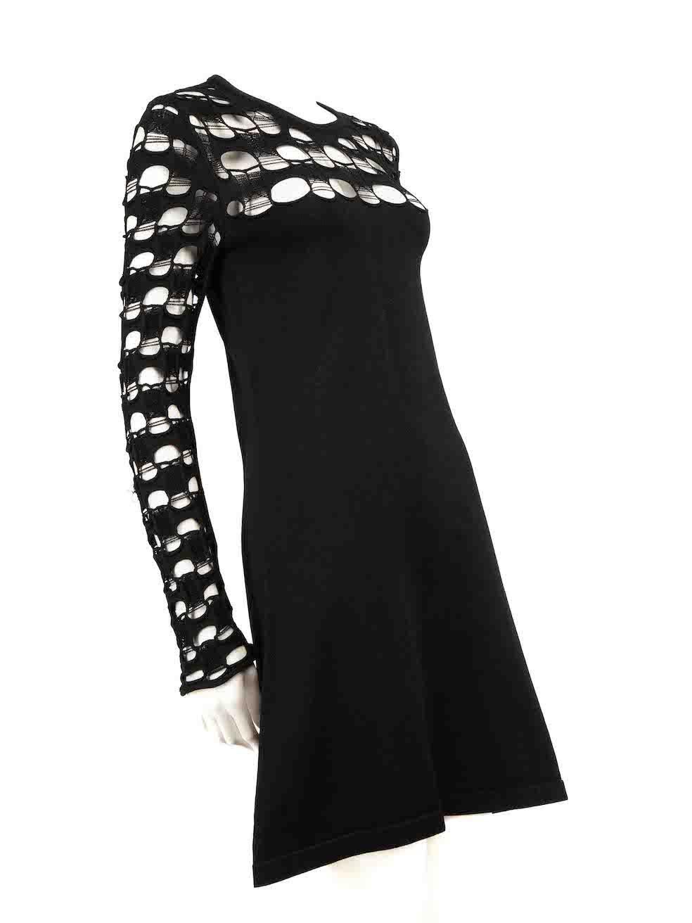 CONDITION is Very good. Minimal wear to the dress is evident. A pull thread to weave is seen on the right sleeve on this used Louis Vuitton designer resale item.
 
 
 
 Details
 
 
 Black
 
 Viscose
 
 Knee length dress
 
 Long sleeves
 
 Fine