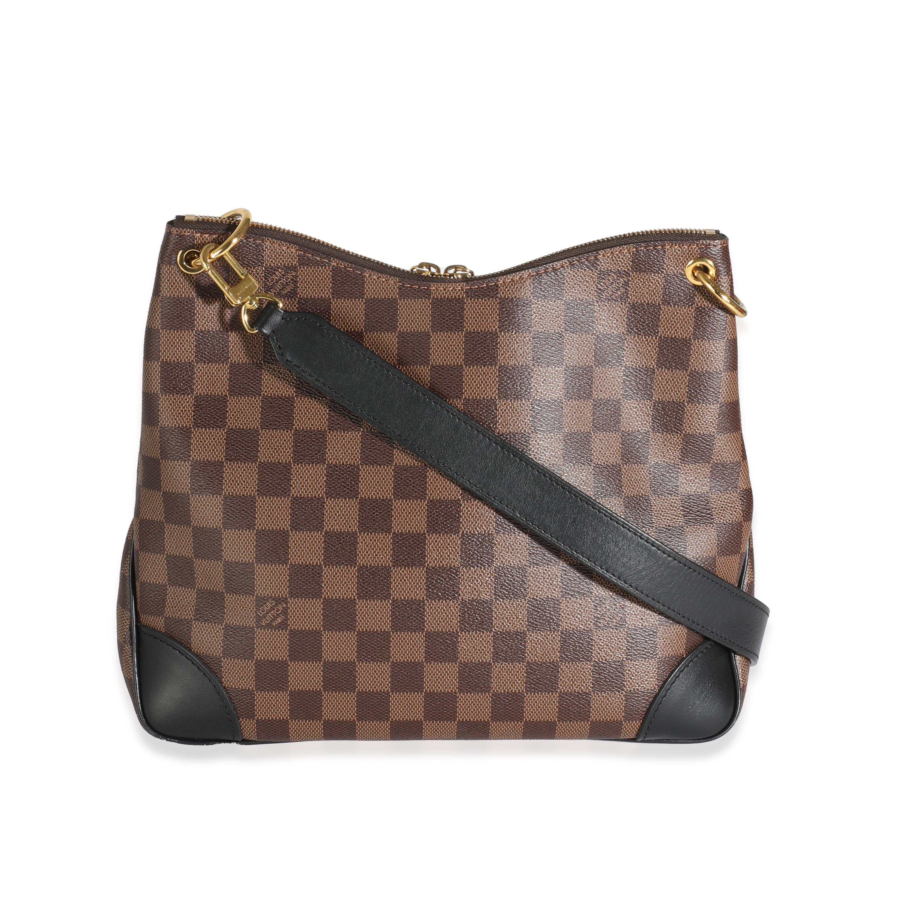 Listing Title: Louis Vuitton Black Damier Ebene Canvas Odeon MM
SKU: 144073
Condition: Pre-owned 
Handbag Condition: Very Good
Condition Comments: Item is in very good condition with minor signs of wear.   Scuffing along corners and marks along