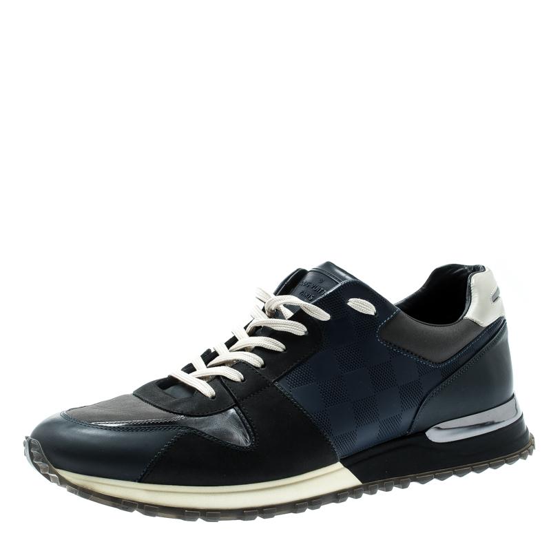Made to provide comfort, these Run Away sneakers by Louis Vuitton are trendy and stylish. They've been crafted from Damier fabric, leather trims and designed with lace-up vamps and the label on the rear. Wear them with your casual outfits for a