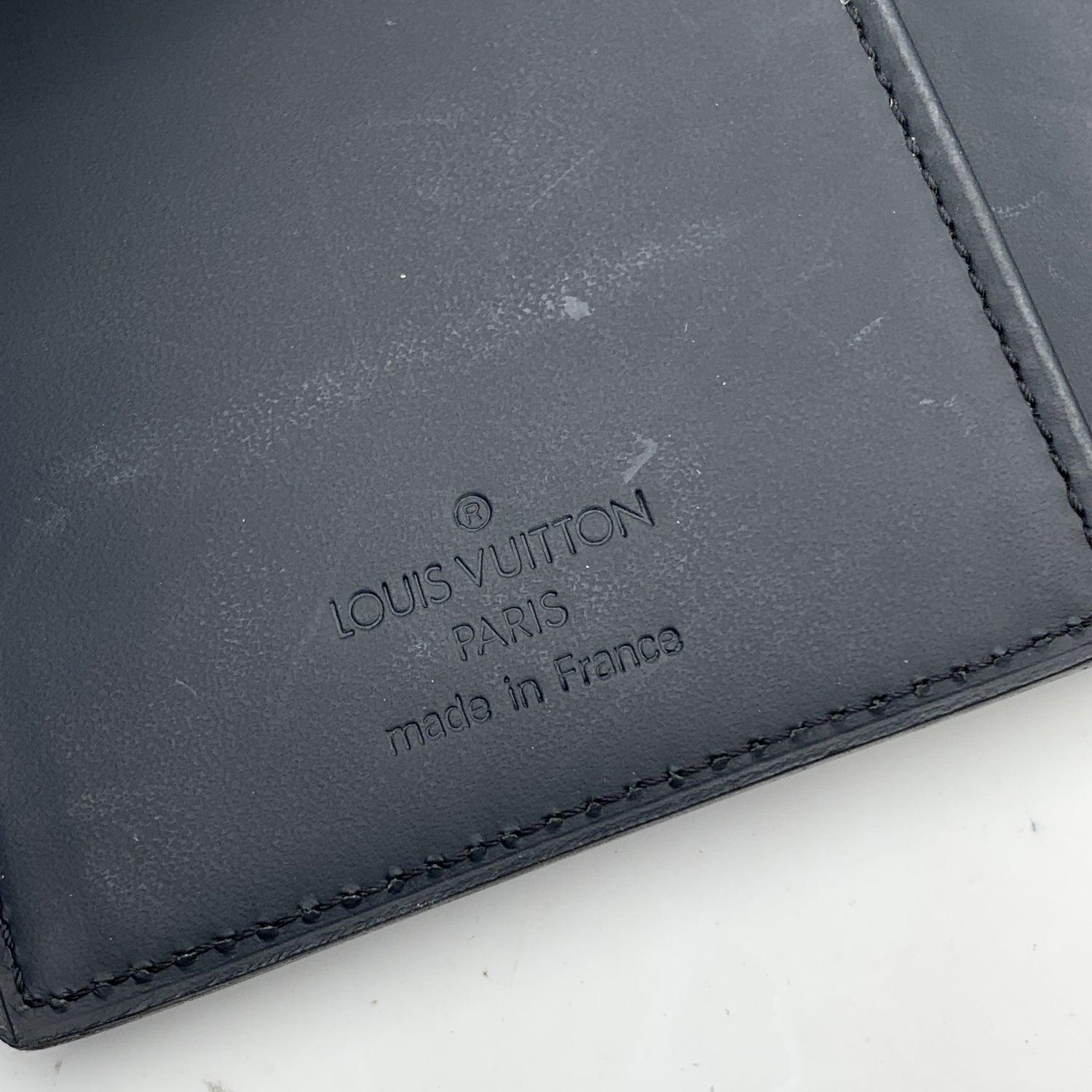 Women's or Men's Louis Vuitton Black Damier Infini Leather Vertical Bifold Long Wallet For Sale