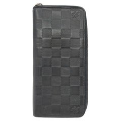 Louis Vuitton Portafoglio verticale Zippy in pelle Damier Infini nera 863454