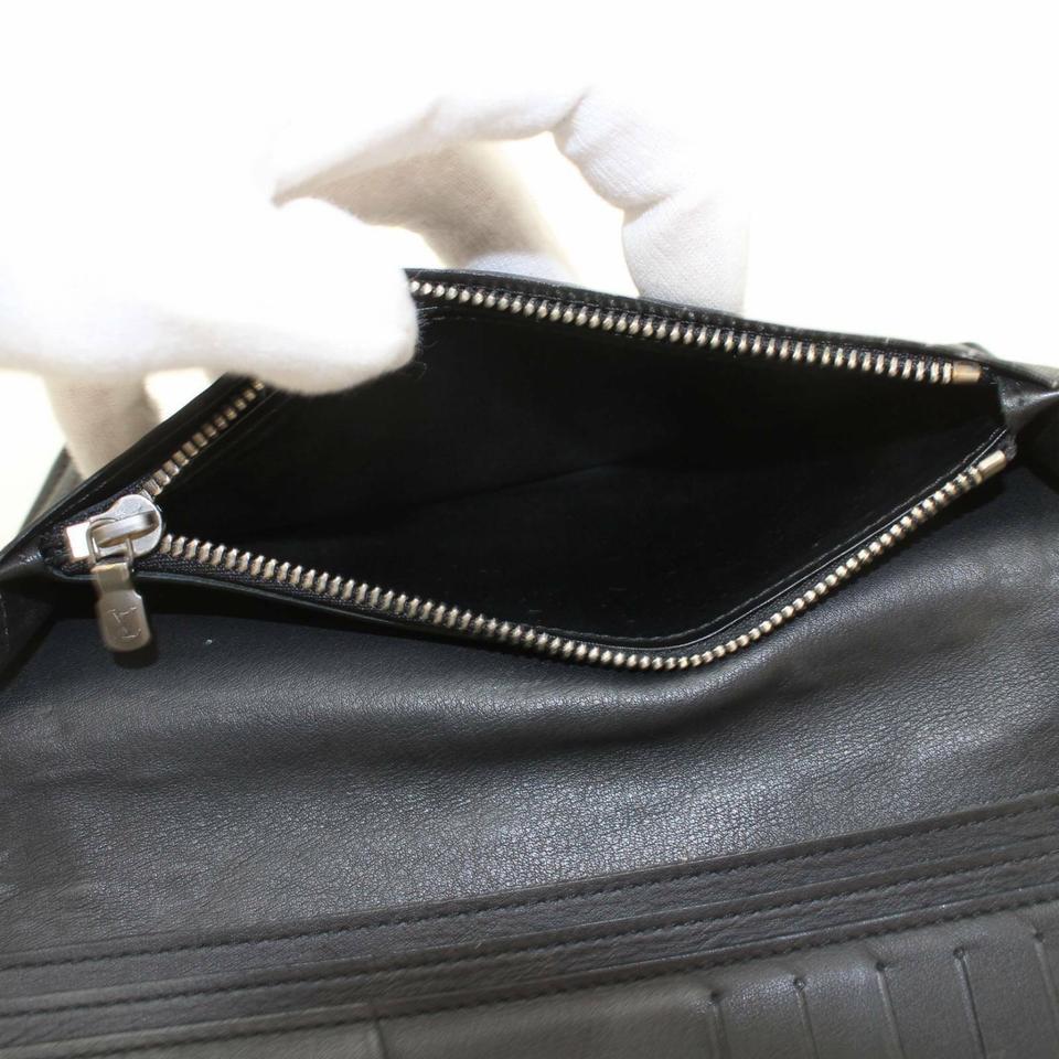Louis Vuitton - Portefeuille Brazza à rabat long en damier infini noir à rabat bifold I871371 en vente 1