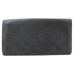 Louis Vuitton Black Brazza Taiga James Bifold Long Flap 5lk1210