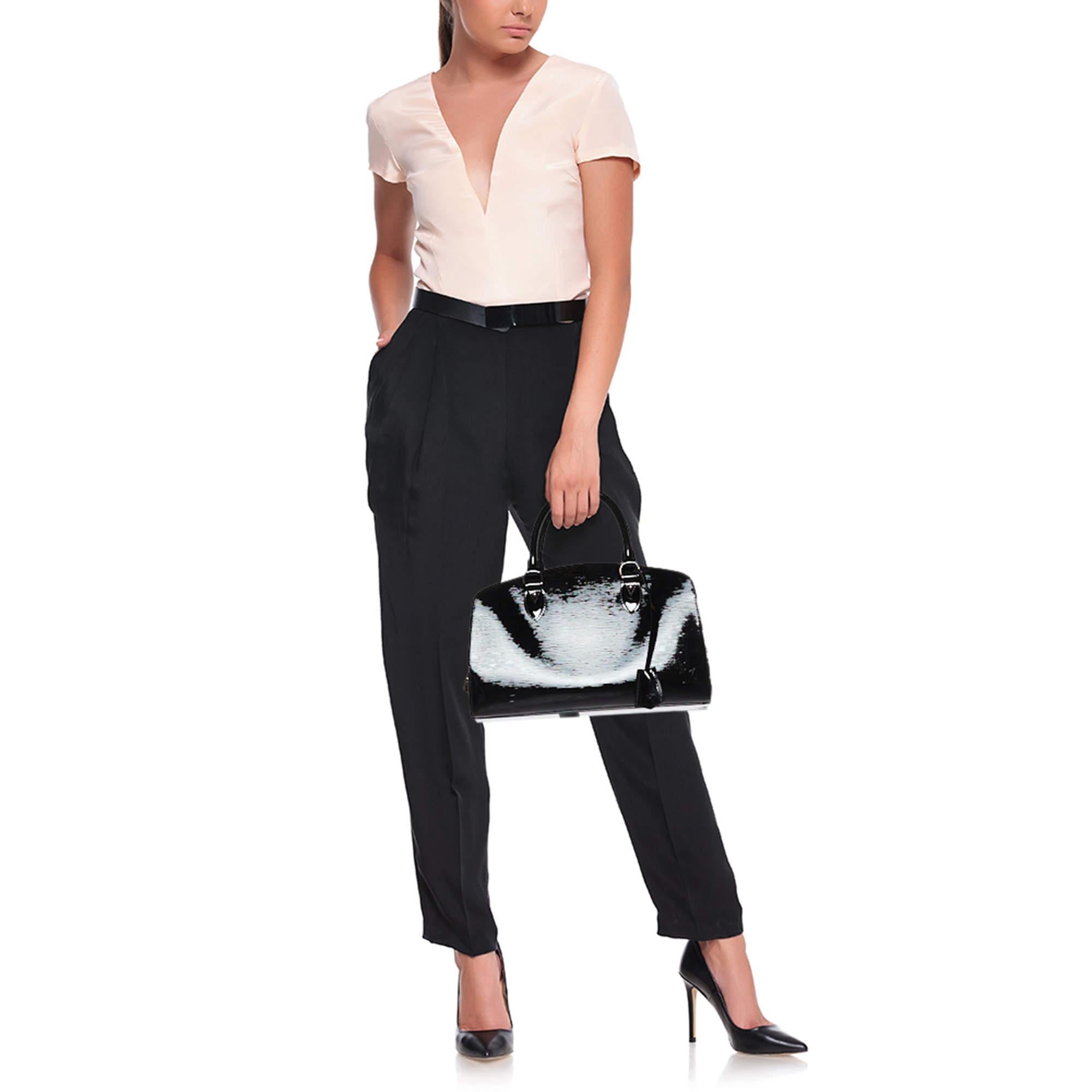 Designer bags are ideal companions for ample occasions Here we have a fashion meets functionality piece crafted with precision. It has been equipped with a well sized interior that can easily fit all your essentials.